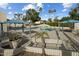 Enjoy lounging poolside at the neighborhood's community swimming pool at 2256 S Noche De Paz --, Mesa, AZ 85202