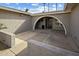 Inviting entryway with an arched facade that offers privacy and visual appeal to the home's entrance at 2256 S Noche De Paz --, Mesa, AZ 85202