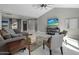 Cozy living room with comfortable sofa and views of the entry door and TV area at 2256 S Noche De Paz --, Mesa, AZ 85202