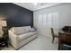 Modern office space featuring an accent wall, lots of natural light, and updated flooring at 2256 S Noche De Paz --, Mesa, AZ 85202