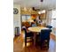 Dining room near the kitchen with an elegant table set and a chandelier at 2323 E Hazeltine Way, Chandler, AZ 85249