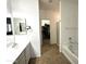 Bright bathroom boasts double sink vanity, separate shower and tub for added convenience at 236 N Wesley --, Mesa, AZ 85207