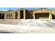 Charming single-story home featuring a two-car garage and low-maintenance desert landscaping at 236 N Wesley --, Mesa, AZ 85207