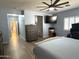 Bright main bedroom with a calming color palette, wood floors, and modern furnishings at 236 N Wesley --, Mesa, AZ 85207