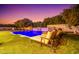 Backyard featuring a pool with water feature and lounge chairs at 2458 E Melrose St, Mesa, AZ 85213