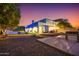 Backyard featuring a pool, outdoor seating, and mature landscaping at 2458 E Melrose St, Mesa, AZ 85213