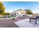 Expansive backyard features ample patio space, lush landscaping, outdoor seating, and a sparkling pool, perfect for entertaining guests at 2458 E Melrose St, Mesa, AZ 85213