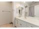 Well-lit bathroom features a large mirror, vanity area and neutral color palette at 2458 E Melrose St, Mesa, AZ 85213