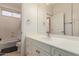 Bright bathroom with a white vanity, mirror, and a bathtub/shower combination for versatile use at 2458 E Melrose St, Mesa, AZ 85213