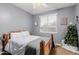 Nicely decorated bedroom with an eye-catching wooden bed frame and a comfortable atmosphere at 2458 E Melrose St, Mesa, AZ 85213