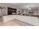 Well-appointed kitchen featuring granite countertops, custom cabinetry, and modern appliances at 2458 E Melrose St, Mesa, AZ 85213