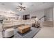 Inviting living room offers a large, comfortable sectional sofa and neutral color palette at 2458 E Melrose St, Mesa, AZ 85213