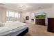 Inviting main bedroom with private balcony, fireplace and flat screen television at 2458 E Melrose St, Mesa, AZ 85213