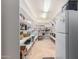 Walk-in pantry with lots of shelving provides lots of space for food storage at 2458 E Melrose St, Mesa, AZ 85213
