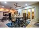 Charming covered patio with a dining area and outdoor seating at 2458 E Melrose St, Mesa, AZ 85213