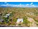 Stunning aerial view of a home and desert community with mountain views in the distance on a clear day at 27467 N 75Th Way, Scottsdale, AZ 85266