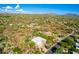 Wonderful aerial view of a home in a desert community on a bright day with mountain views at 27467 N 75Th Way, Scottsdale, AZ 85266