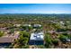 Aerial view showcases a neighborhood community and the unique desert landscape at 27467 N 75Th Way, Scottsdale, AZ 85266