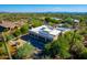 Aerial view of home featuring a backyard pool and lush desert landscaping at 27467 N 75Th Way, Scottsdale, AZ 85266
