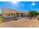 Back of home with fenced pool, low-maintenance desert landscaping, and patio at 27467 N 75Th Way, Scottsdale, AZ 85266