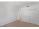 Bedroom featuring carpet floors and a closet with sliding doors at 27467 N 75Th Way, Scottsdale, AZ 85266