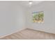 Bright bedroom with a ceiling fan and view of the exterior at 27467 N 75Th Way, Scottsdale, AZ 85266