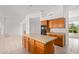 View of the kitchen area with an island and appliances at 27467 N 75Th Way, Scottsdale, AZ 85266