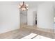 Spacious living room has neutral carpet with foyer and hallway access at 27467 N 75Th Way, Scottsdale, AZ 85266