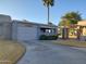 Charming single-story home with a private driveway, desert landscaping, and a covered patio area at 276 Leisure World --, Mesa, AZ 85206