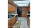 Functional kitchen with stainless steel appliances, wood cabinets, and modern backsplash at 276 Leisure World --, Mesa, AZ 85206