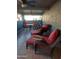 Covered patio space with a seating area, tile floor, and outdoor decor at 276 Leisure World --, Mesa, AZ 85206