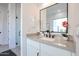 Modern bathroom featuring a sleek vanity with quartz countertops and a glass-enclosed shower at 28265 N 158Th St, Scottsdale, AZ 85262