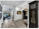 Hallway view showcasing the access to the outdoor space and decorative bar at 3947 E Austin Dr, Gilbert, AZ 85296