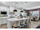 Bright kitchen with an island, pendant lighting, and an adjacent dining area perfect for modern living at 3947 E Austin Dr, Gilbert, AZ 85296