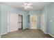 Light-filled bedroom with closet and an ensuite bathroom at 4202 E Broadway Rd # 93, Mesa, AZ 85206