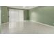 Spacious living room offering a neutral color palette and a sliding glass door at 4202 E Broadway Rd # 93, Mesa, AZ 85206