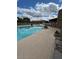 Enjoy the community pool, complete with seating and shade at 4202 E Broadway Rd # 93, Mesa, AZ 85206