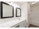 Bright bathroom with a white vanity, dual sinks, and a shower-tub combination at 433 E Utopia Rd, Phoenix, AZ 85024