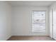 Clean and tidy bedroom with natural light streaming through the window at 433 E Utopia Rd, Phoenix, AZ 85024