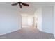 A well lit bedroom boasts neutral carpet at 433 E Utopia Rd, Phoenix, AZ 85024
