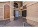Inviting front entrance with a light blue door, decorative windows, and elegant architectural details at 433 E Utopia Rd, Phoenix, AZ 85024