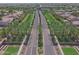 Aerial view of Villages at Rancho El Dorado with well-maintained streets and landscaping at 44196 W Askew Dr, Maricopa, AZ 85138