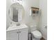 Stylish half bath with modern fixtures and decorative elements at 44196 W Askew Dr, Maricopa, AZ 85138