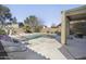 Picturesque backyard with a refreshing pool, ideal for outdoor enjoyment at 44196 W Askew Dr, Maricopa, AZ 85138