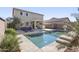 Inviting backyard pool area with lounge chairs and mature landscaping at 44196 W Askew Dr, Maricopa, AZ 85138
