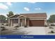 Charming single-story home featuring desert landscaping and a welcoming covered entryway at 4424 S 127Th Ave, Avondale, AZ 85323