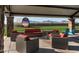 Outdoor seating area with comfortable couches and chairs offering a relaxing space at 4424 S 127Th Ave, Avondale, AZ 85323