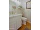 Bathroom featuring tile floors, updated faucet, and a soft neutral color palette at 7103 N 28Th Dr, Phoenix, AZ 85051