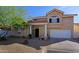 Charming two-story home with landscaped yard, desert landscaping, and a two car garage at 7103 N 28Th Dr, Phoenix, AZ 85051