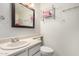 Bathroom featuring a white vanity, mirror, and essential fixtures at 7977 W Wacker Rd # 171, Peoria, AZ 85381